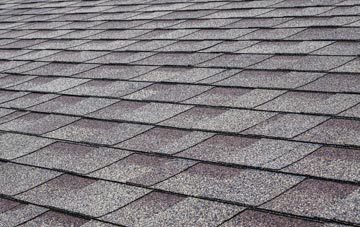 Downside tiles for shallow pitch roofing